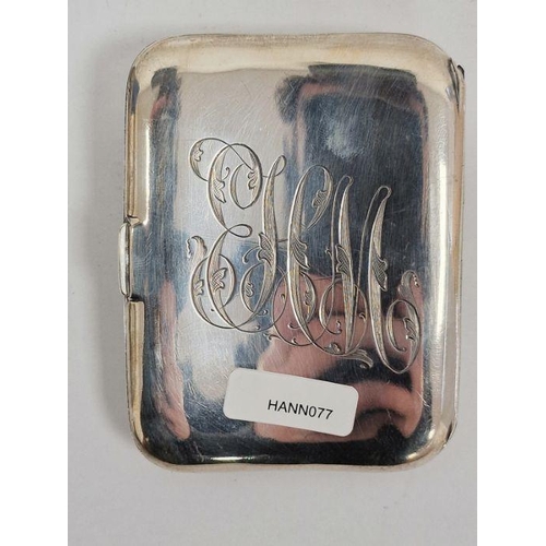 390 - Early 20th century silver-coloured metal card case, repousse decorated with female nude, gilt interi... 