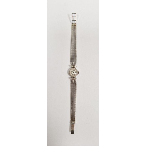 401 - Mid-century lady's 9ct white gold and diamond set Movado cocktail wristwatch, the circular dial havi... 