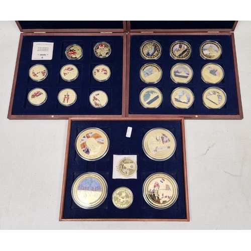 420 - Collection of commemorative coins, in seven wooden cases, to include Winston Churchill copper gold l... 