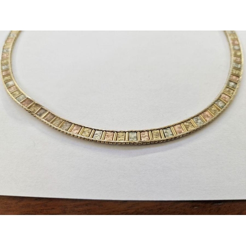 446 - 9ct three-colour gold collarette necklace engraved panels within herringbone border, 26.4g approx.