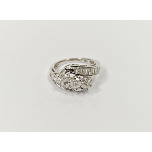 490 - 14ct white gold and diamond dress ring set three central claw set stones, the centre stone 0.35ct ap... 