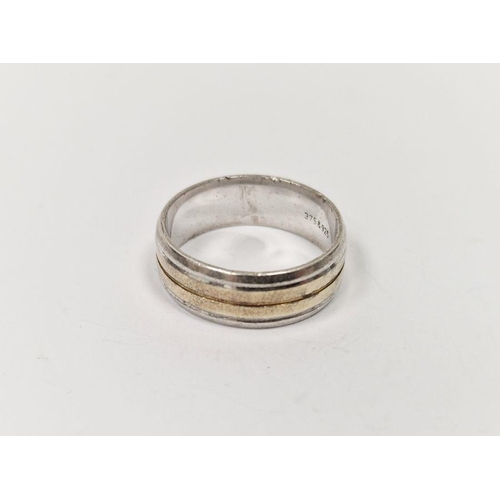 491 - 9ct gold and silver banded ring, line engraved, marked to the inside 375 and 925, 5.5g total