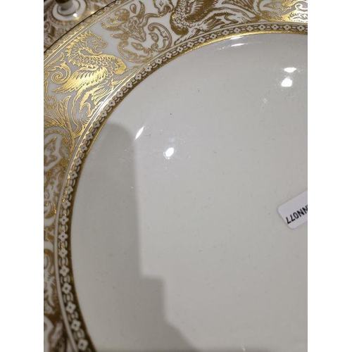 57 - Wedgwood 'Gold Florentine' pattern bone china part dinner service printed with gilt borders of griff... 