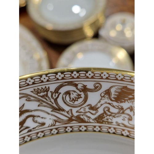 57 - Wedgwood 'Gold Florentine' pattern bone china part dinner service printed with gilt borders of griff... 