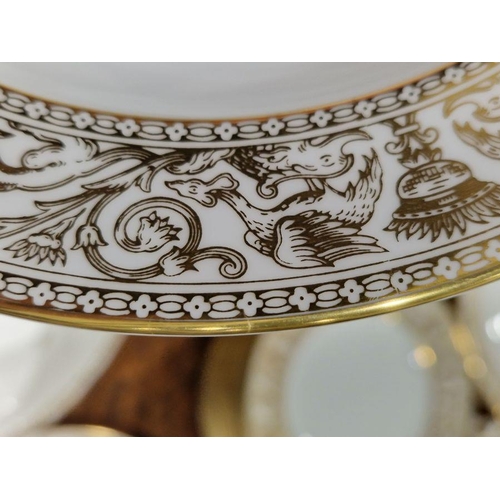 57 - Wedgwood 'Gold Florentine' pattern bone china part dinner service printed with gilt borders of griff... 