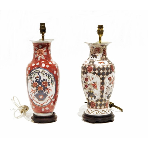 1344 - Two Oriental-style ceramic table lamps, both on wooden circular stands, 45cm and 43cm high (2)