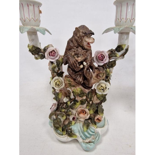 48 - Pair German Plaue porcelain monkey candelabra, each two-branched and floral encrusted with monkeys t... 