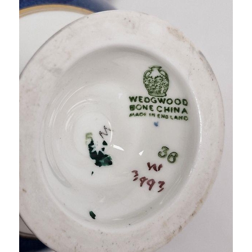 49 - Collection of Poole pottery, Wedgwood, Sylvac and other ceramic items including two Poole dishes, on... 