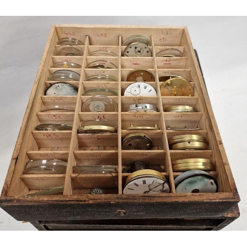 1036 - 20th century stained wooden storage cabinet containing a quantity of assorted pocket watch movements... 