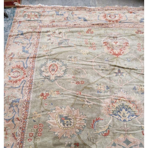 1049 - Very large pale green ground Turkish wool rug with central floral medallion on floral interlocked fi... 