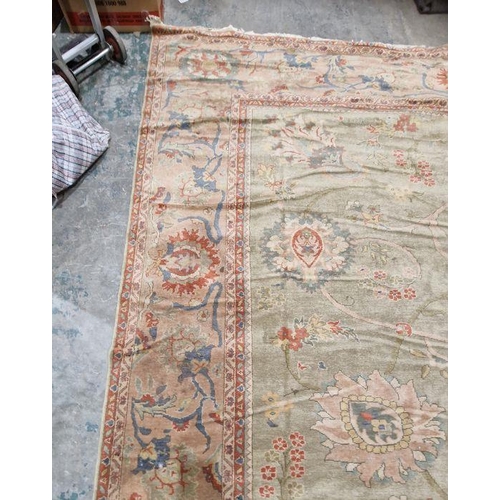 1049 - Very large pale green ground Turkish wool rug with central floral medallion on floral interlocked fi... 