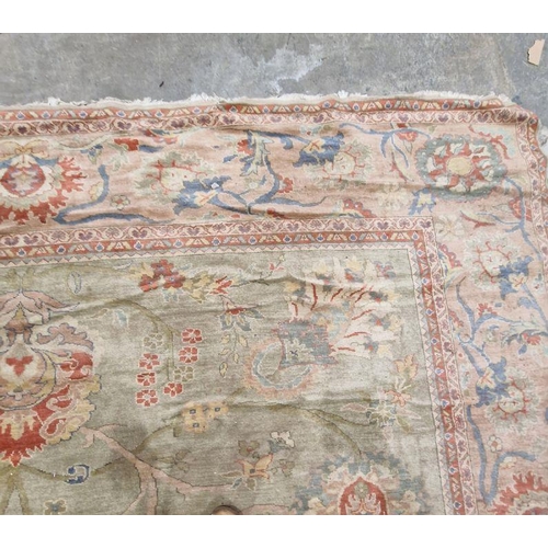 1049 - Very large pale green ground Turkish wool rug with central floral medallion on floral interlocked fi... 