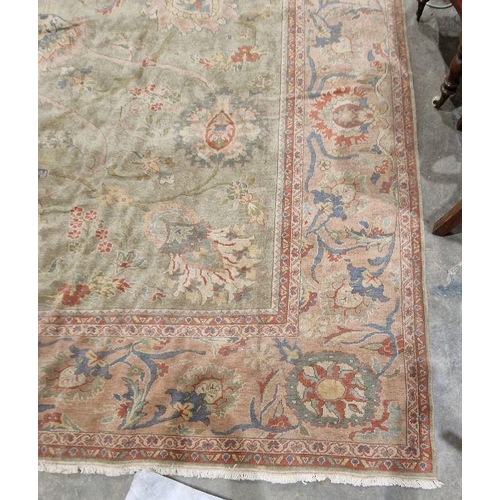 1049 - Very large pale green ground Turkish wool rug with central floral medallion on floral interlocked fi... 