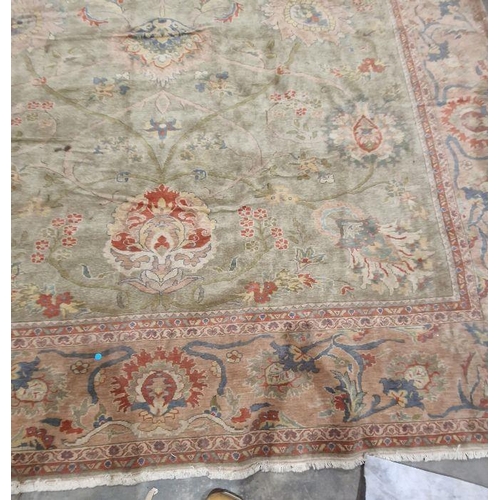 1049 - Very large pale green ground Turkish wool rug with central floral medallion on floral interlocked fi... 