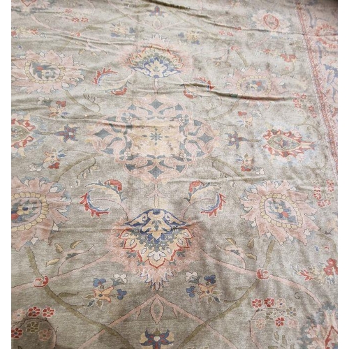 1049 - Very large pale green ground Turkish wool rug with central floral medallion on floral interlocked fi... 