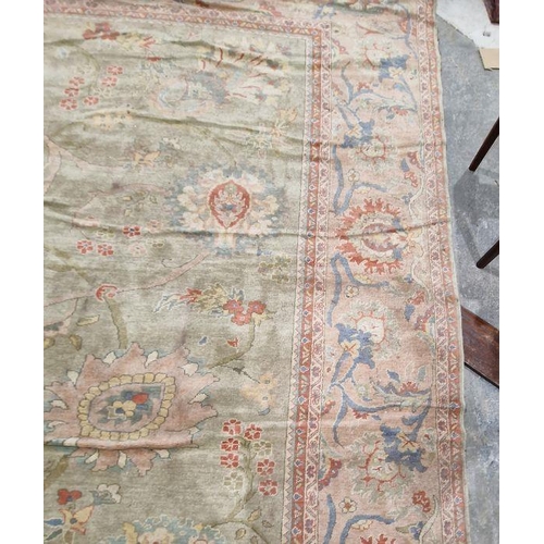 1049 - Very large pale green ground Turkish wool rug with central floral medallion on floral interlocked fi... 