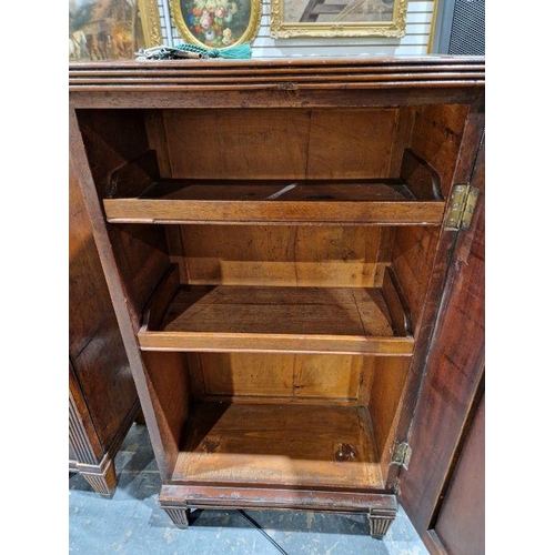 1221 - Pair of 19th century mahogany cabinets revived Georgian in style, each opening to reveal two fitted ... 