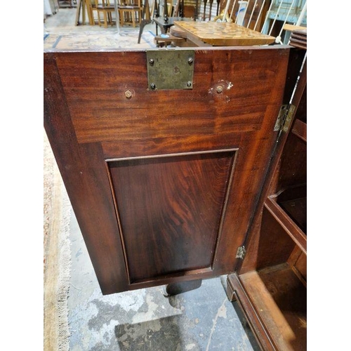 1221 - Pair of 19th century mahogany cabinets revived Georgian in style, each opening to reveal two fitted ... 