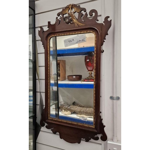 1244 - Late 19th/early 20th century mahogany wall mirror with gilt decorated eagle finial to top, 91cm high... 