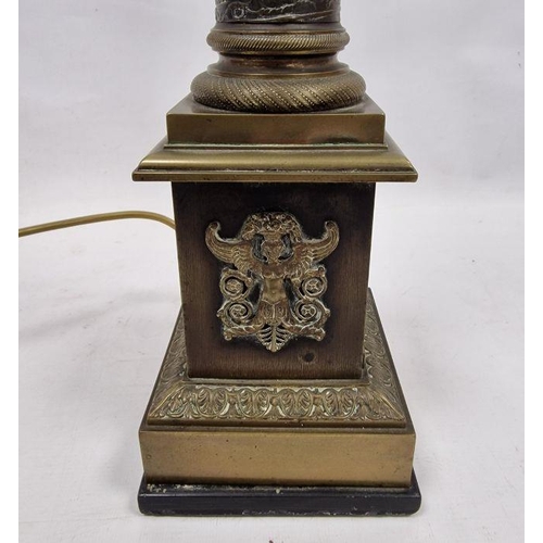 217 - Brass table lamp with foliate terminal, running bird and floral basket design to the column, the squ... 