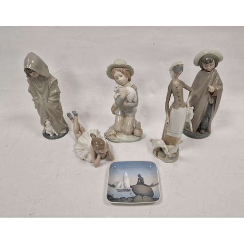 23 - Lladro porcelain group of a goose girl with geese, three Nao figures, another figure and a Royal Cop... 