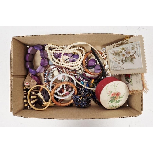 314 - Assorted costume jewellery, to include bangles, necklaces etc, also including WWI postcards