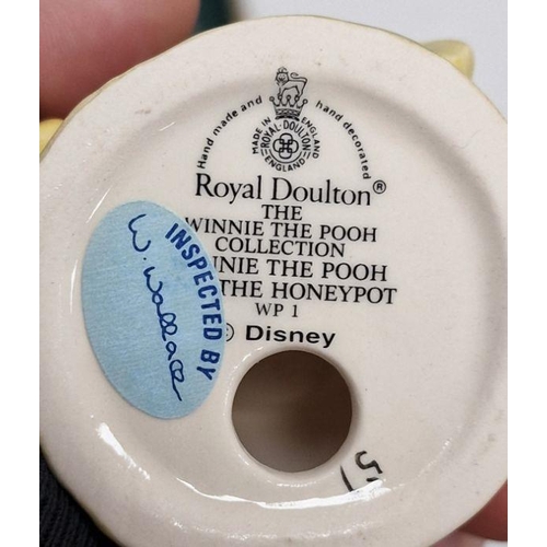 33 - Seven Royal Doulton 'Winnie the Pooh' figures to include Christopher Robin, Tigger, Winnie the Pooh,... 