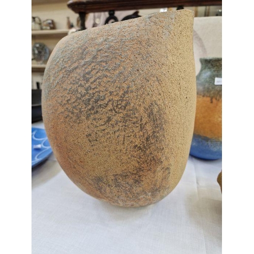 50 - Betty Blandino (1927-2011) hand built stoneware vessel of asymmetrical form with dark matte glazes o... 