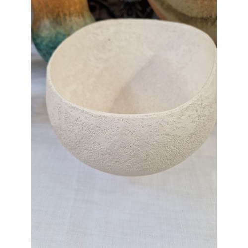 50A - Betty Blandino (1927-2011) Hand built white stoneware vessel of asymmetrical form with textured surf... 