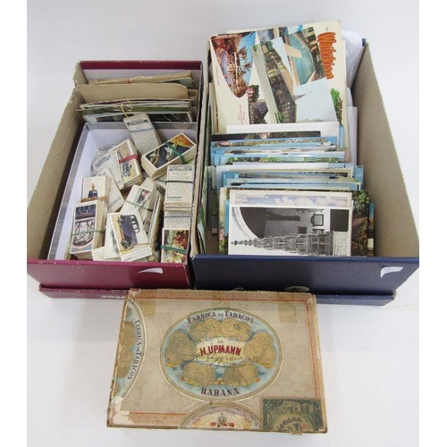 135 - Quantity of various 20th century cigarette cards and postcards (2 boxes).