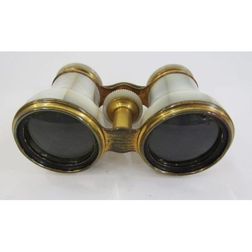 145 - Pair of early 20th century mother-of-pearl and gilt metal opera glasses by 