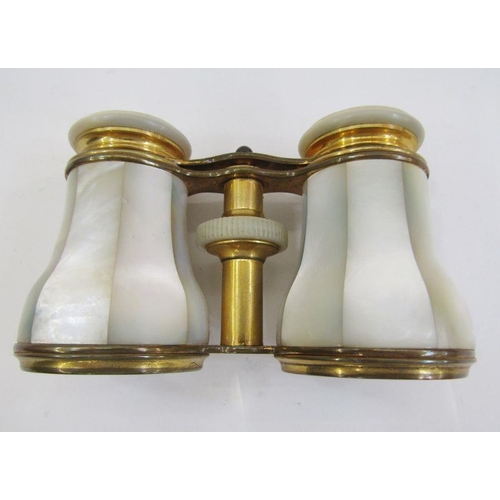 145 - Pair of early 20th century mother-of-pearl and gilt metal opera glasses by 