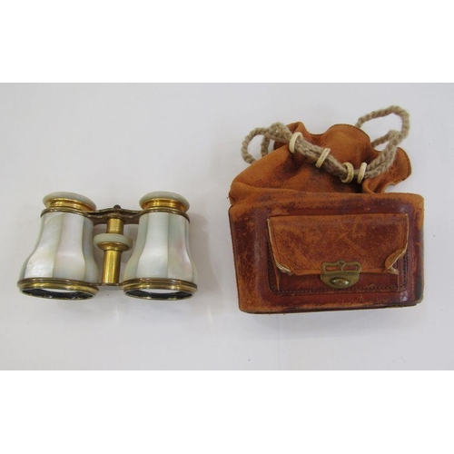 145 - Pair of early 20th century mother-of-pearl and gilt metal opera glasses by 