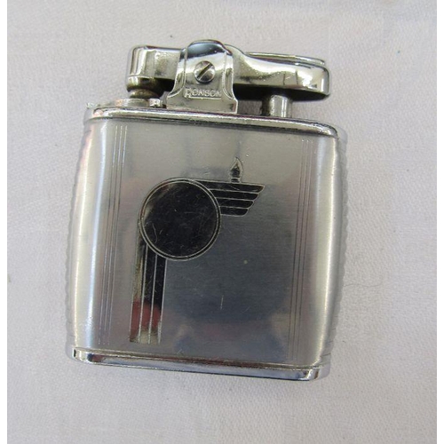 147 - Collectable items; a Colibri lighter in black leather case, a 1950s football medallion, cigar cutter... 