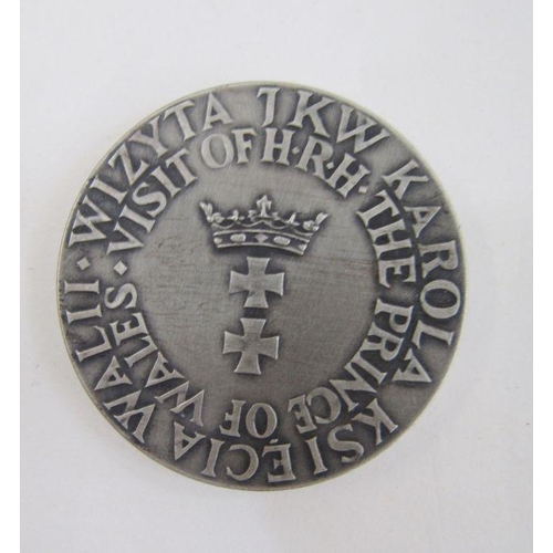 148 - Polish commemorative medal for the visit of HRH Prince of Wales and pin.