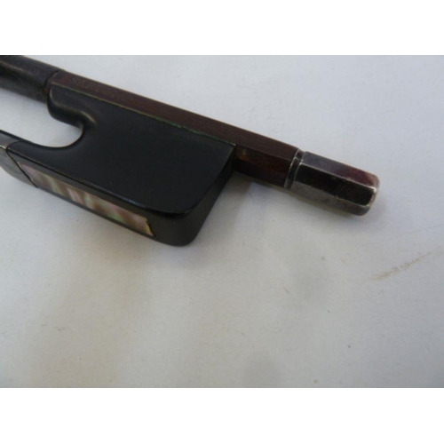 151 - Violin bow having silver mounts and aventurine inlay, stamped 'Sartory', 74cm long.