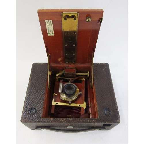 162 - Bell & Howell 200 EE movie camera in brown leather carrying case, an Eastman Kodak folding bellows c... 