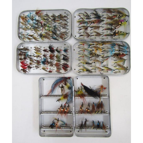 175 - Three metal cases of salmon and fly fishing flies.