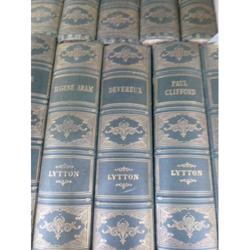 18 - Bindings to include:-
 Lord Lytton
 Works, published G J Howell & Co, green cloth, gilt titles and d... 