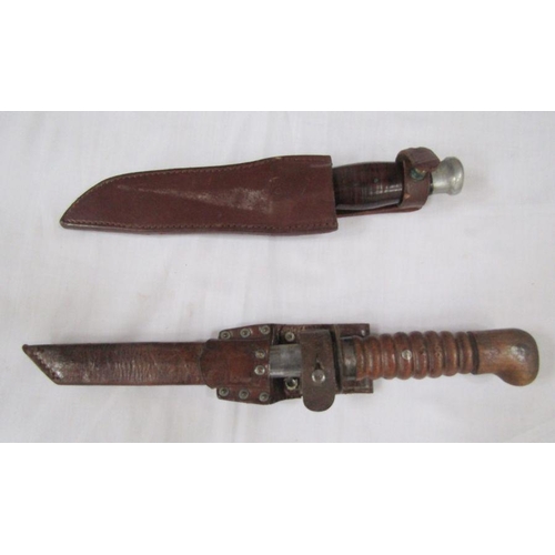 200 - Two vintage hunting knives with leather sheaths (one made by Christopher Johnson of Sheffield)