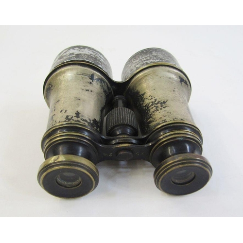 202 - WWI era binoculars in leather case stamped with broad arrow. Together with an artillery clinometer s... 