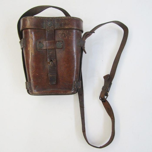 202 - WWI era binoculars in leather case stamped with broad arrow. Together with an artillery clinometer s... 