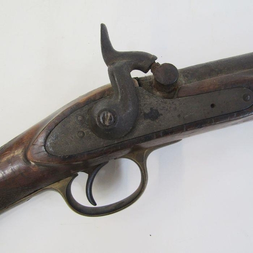 212 - A 19th century percussion rifle with walnut and brass stock, complete with ram-rod.