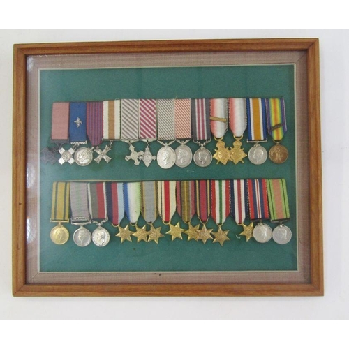 216 - Collection of miniature gallantry medals and campaign medals within glazed frame.