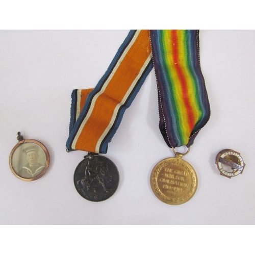 217 - WWI war and victory medals named to '254921, SPR. FJ Knowles RE'. Locket with photographs of a soldi... 