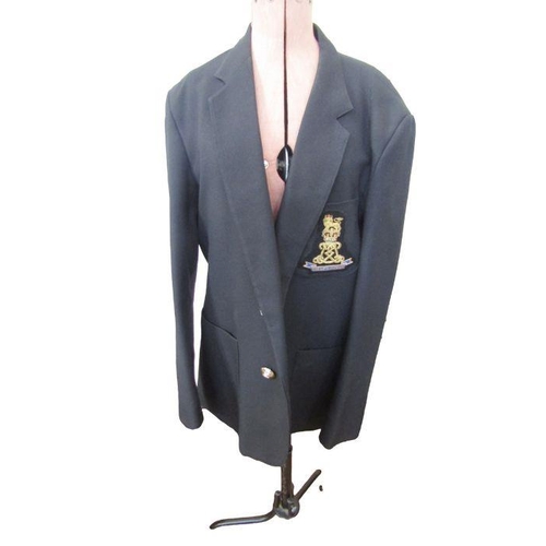 234 - Two black blazers with Life Guards blazer badges, pair of trousers and tie.