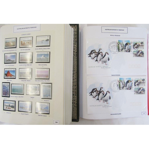 271 - Australian Antarctic Territory: box of 4 large albums with mint/used definitives and commemoratives;... 