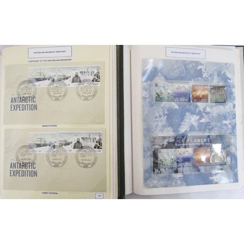 271 - Australian Antarctic Territory: box of 4 large albums with mint/used definitives and commemoratives;... 