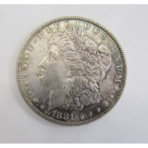 439 - United States 1881 New Orleans Morgan Dollar, mottled toning, good very fine