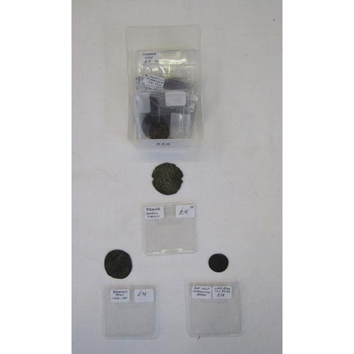 442 - Group of Roman (12) bronze coins in various grades, mostly low, including: three Byzantine coins and... 